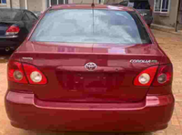 Red Toyota Corolla 